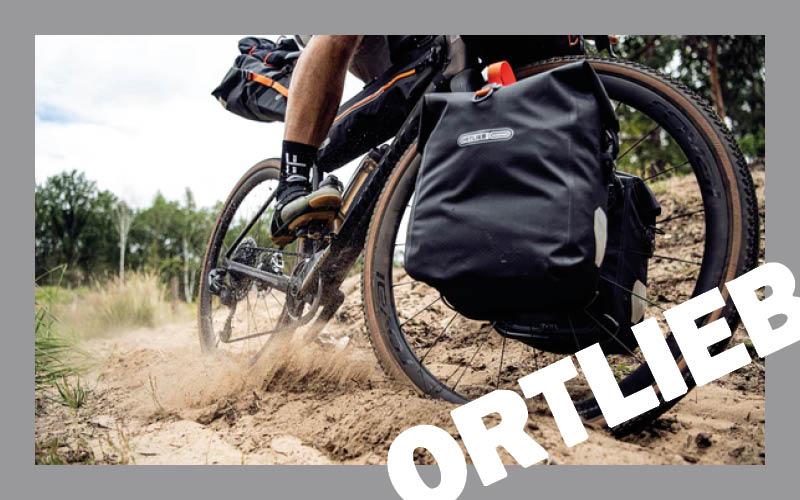 <p>Als je op zoek bent naar een goede waterdichte fietstas van Ortlieb, dan ben je bij Bikeplanet op de juiste plek. Dit merk gebruikt zijn technologische kennis om fiets wielen en onderdelen van zeer hoogwaardige kwaliteit te maken. Bekijk ons assortiment Ortlieb fietstassen!</p>